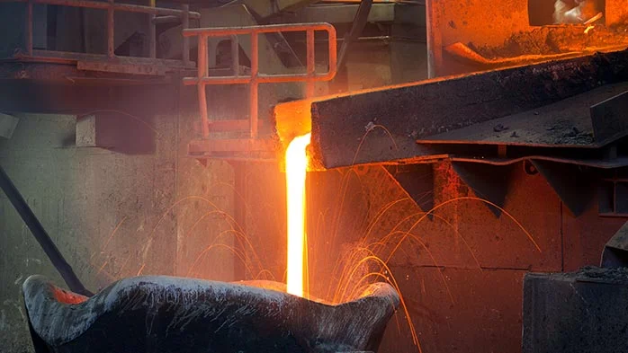 Molten steel being poured during industrial processing